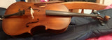 Vintage 1/4 - 1/8 size cello, unbranded, quite nice.  New bridge and Prelude strings.