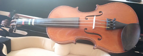 Antique 1/2 size violin.  Dominant strings, Glasser tailpiece.  Violin only.